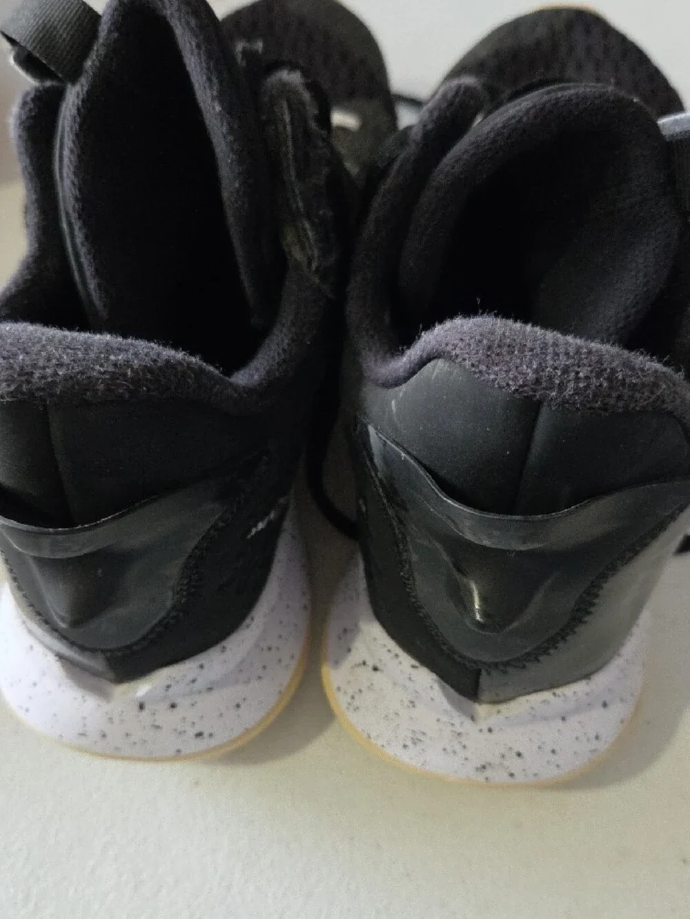 Nike Men's Black Athletic Training Shoes with White Speckled Midsole